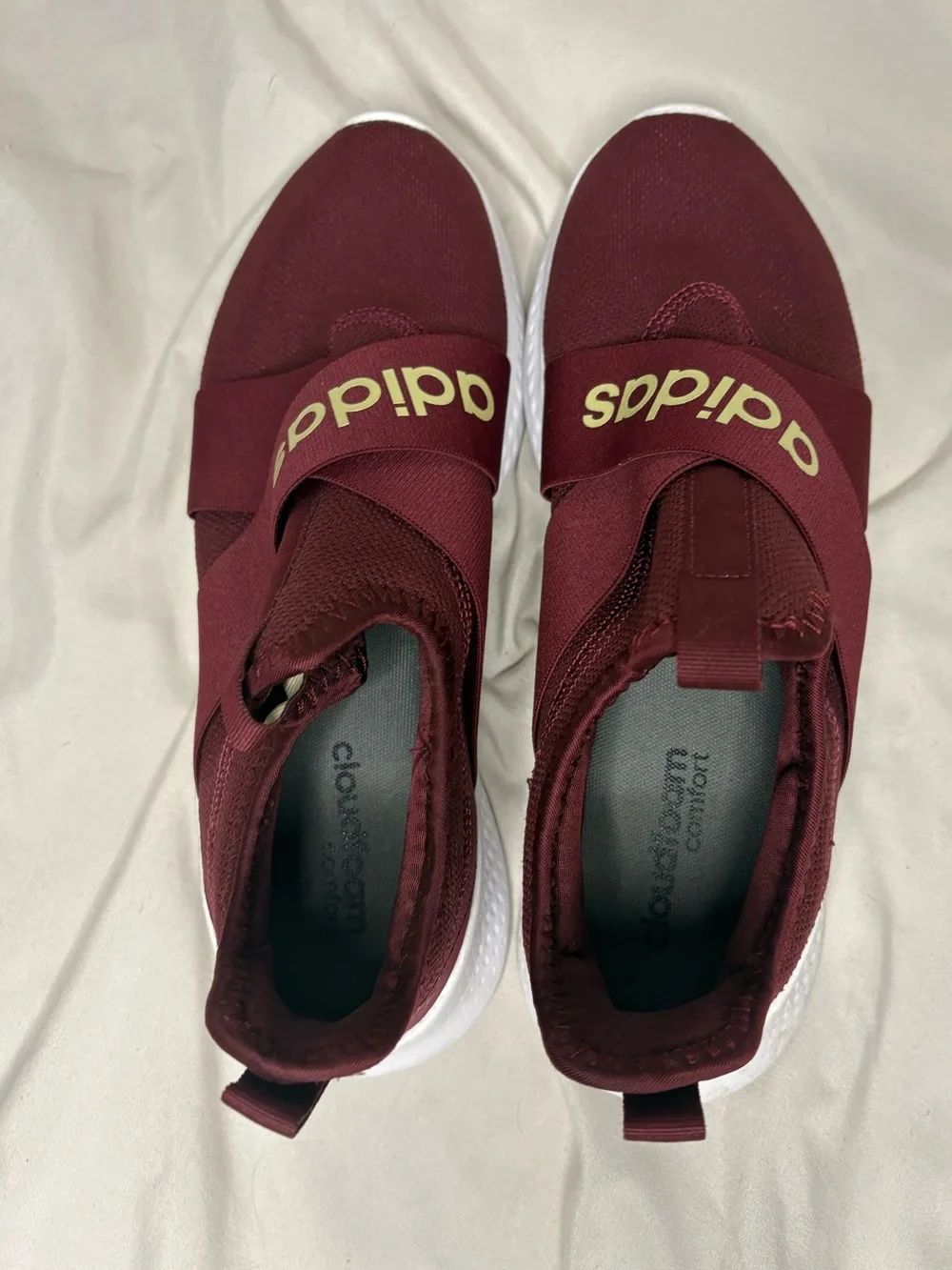 adidas woman’s burgundy sneakers